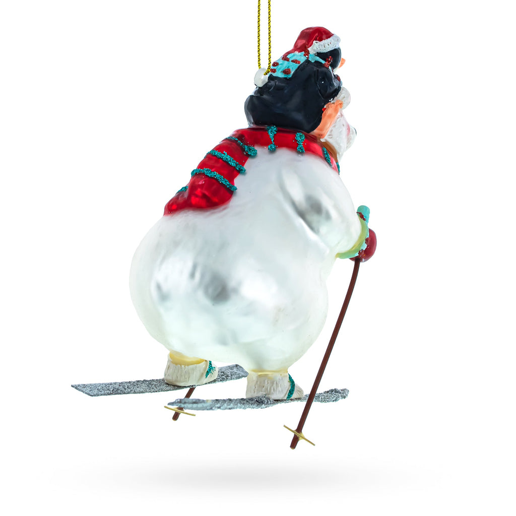 Bear and Penguin Skiing Glass Christmas Ornament