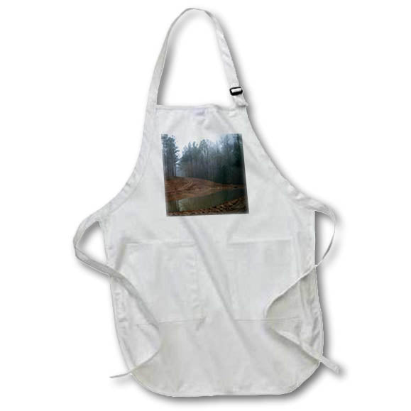 Apron - A photograph of a pond under construction on a foggy morning. Stamp City - nature