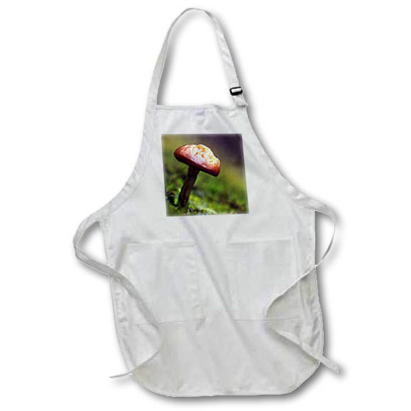 Apron - A close up photograph of a mushroom on a mossy bokeh background. Stamp City - nature