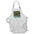 Apron - Photograph of grass, ferns, and fall leaves on the edge of a creek. Stamp City - landscape