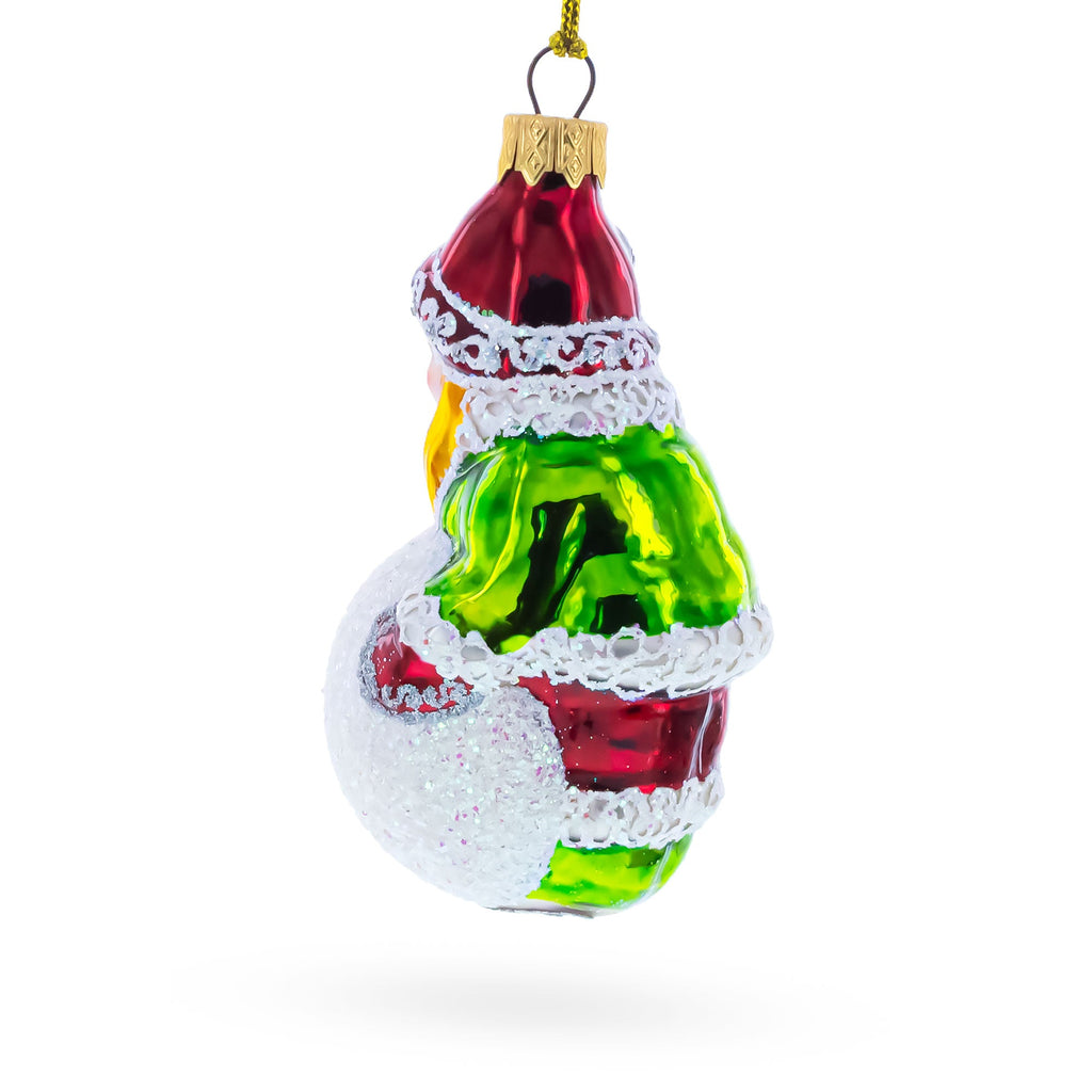 Girl Making a Snowball Glass Christmas Ornament