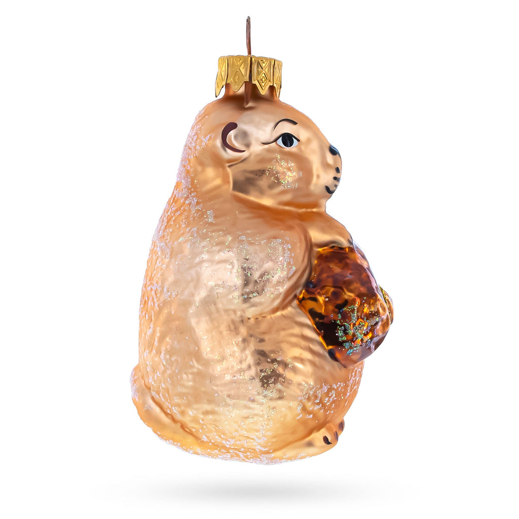 Otter Holding a Log Glass Christmas Ornament