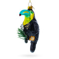 Toucan with Pine Branch Glass Christmas Ornament
