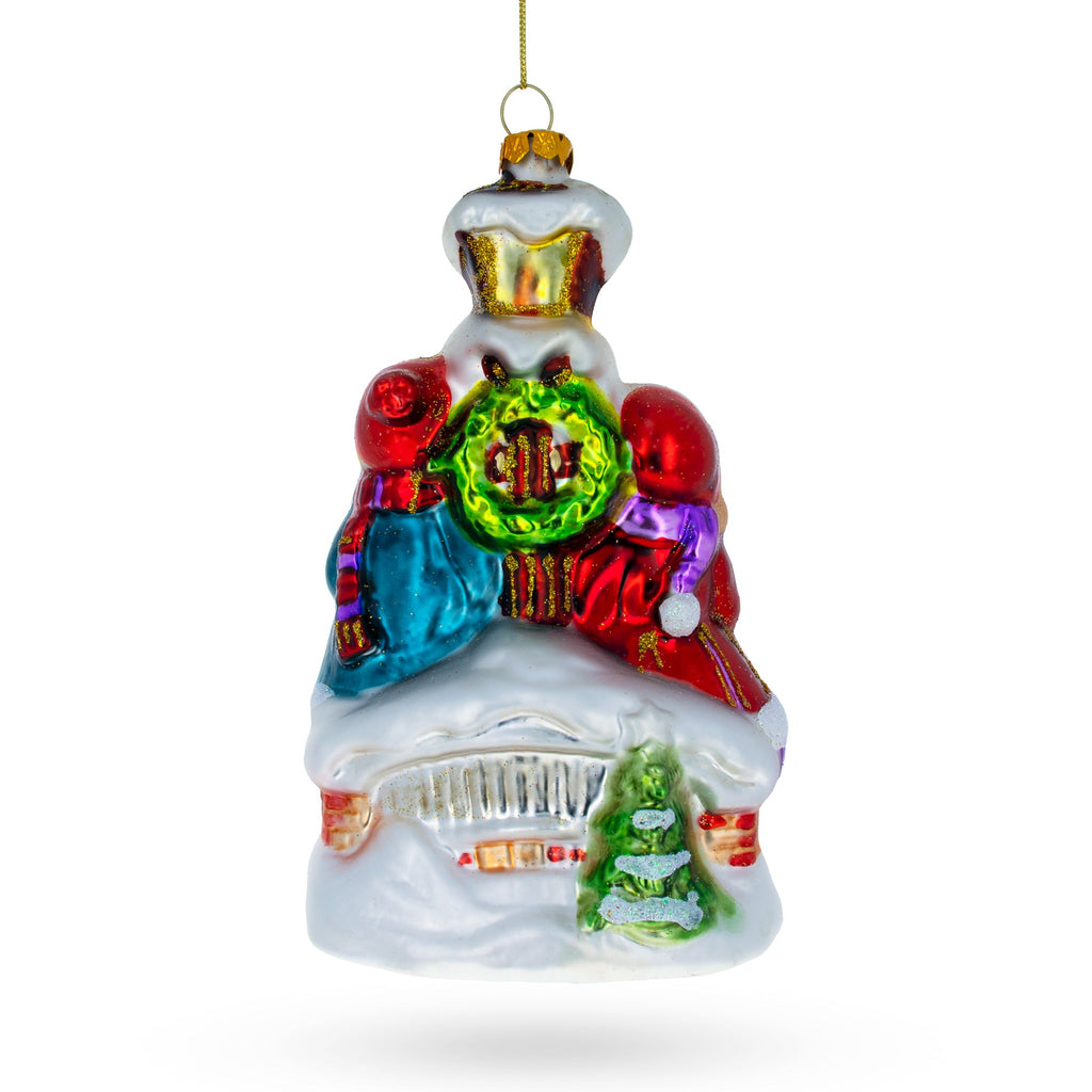 Carolers by a Vintage Lantern Glass Christmas Ornament