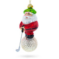 Santa the Golf Player Glass Christmas Ornament