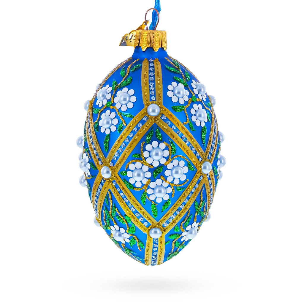 White Pearl Flowers on Blue Glass Egg Ornament 4 Inches