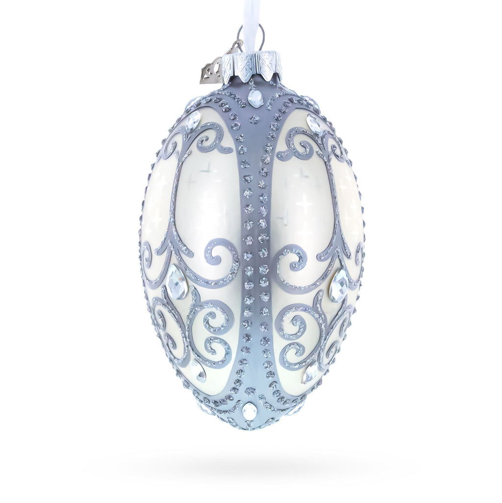 Silver Scrolls on White Glass Egg Ornament 4 Inches