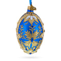 Golden Swirls on Blue Glass Egg Ornament 4 Inches